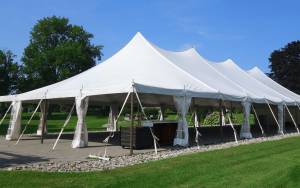 How To Choose The Right Tent Rental Company 4 Professional tent setup for an outdoor event in Sarasota
